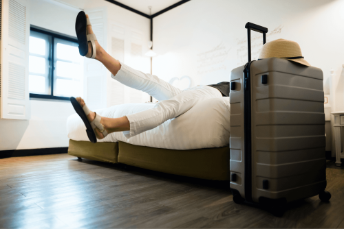 https://www.investectravel.com/wp-content/uploads/2024/04/legs-off-bed.png